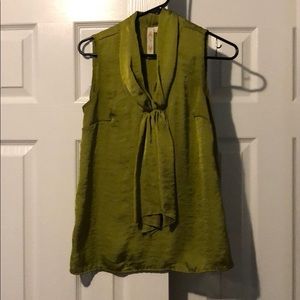 Green sleeveless blouse